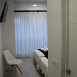 Baixo A Lua Rooming 게스트하우스 사리아루고